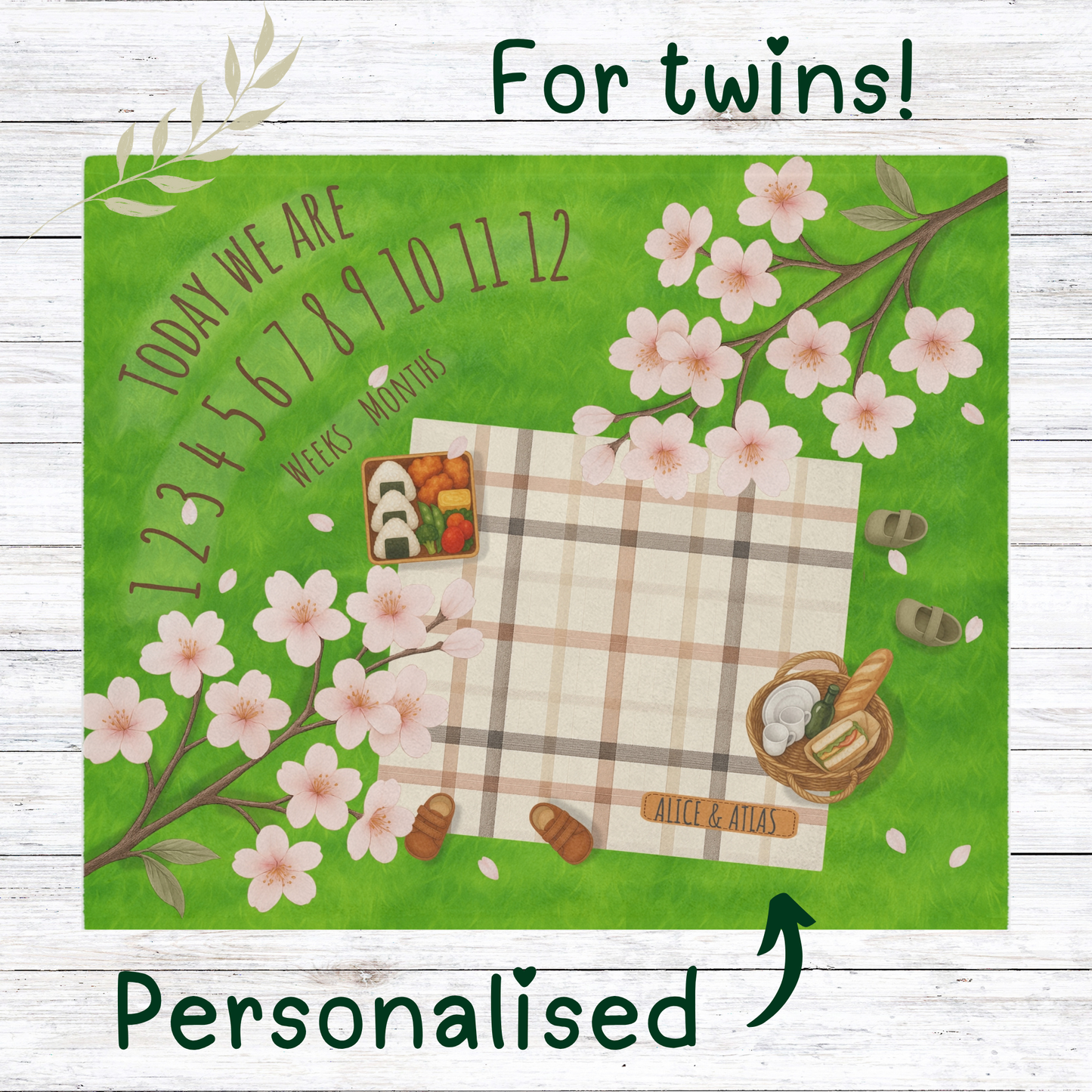 “Twin baby milestone blanket with picnic and cherry blossom design, sherpa fleece backing, featuring double number rows for weeks and months tracking. Perfect for twin baby monthly photos.”