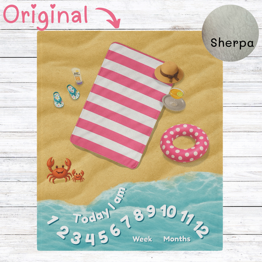“Beach-themed baby milestone blanket with pink striped towel, polka dot float, crab illustration, and sherpa fleece backing. Perfect for summer-themed baby photo sessions and monthly age tracking.”
